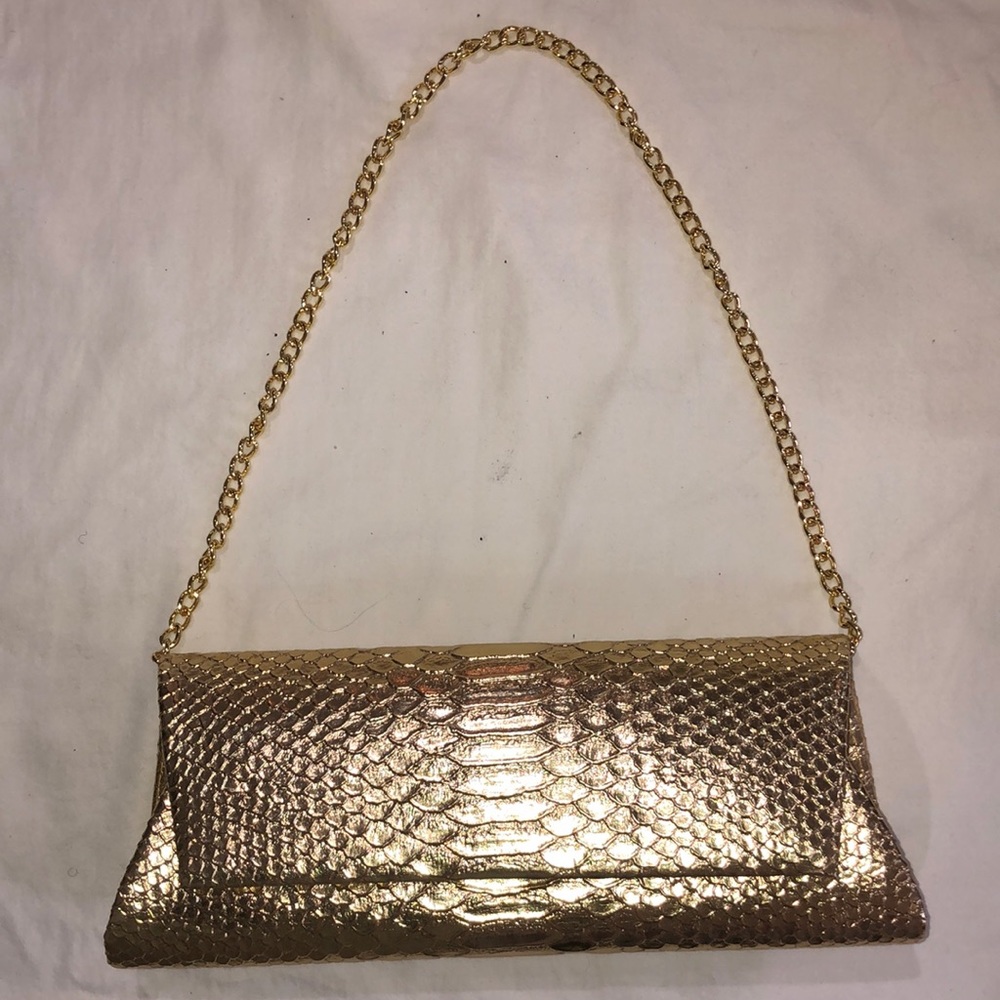 726. OKPTA 1519426 Gold convertible clutch